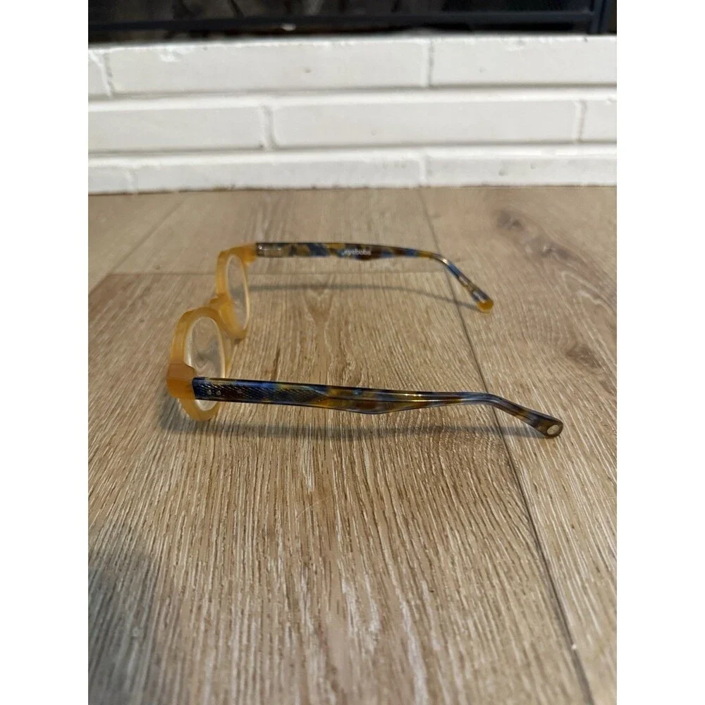 Eyebobs glasses frame TV Party Amber with blue & yellow camo pattern arms